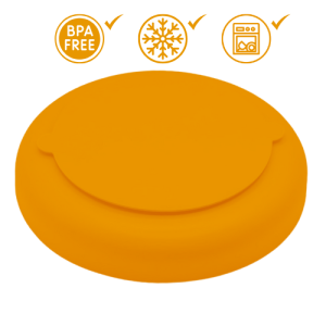 Base de gamelle jaune en silicone retournée, surface antidérapante et alimentaire visible, avec médaille chien.